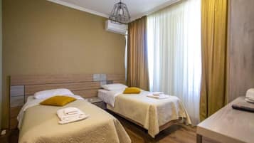 Family Room | 1 bedroom, individually decorated, individually furnished, desk