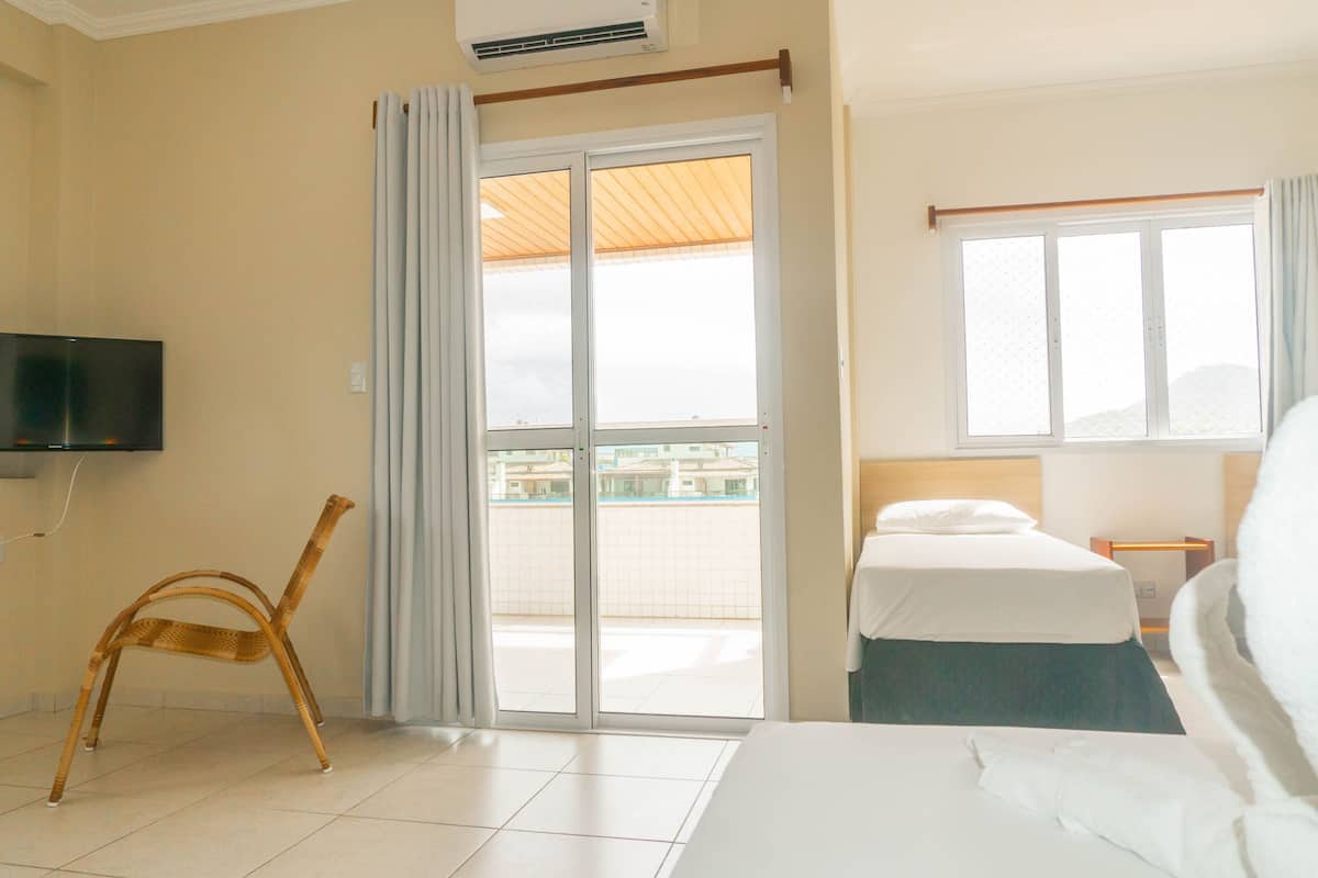 superior quadruple room | 1 bedroom, in-room safe, blackout curtains, iron/ironing board