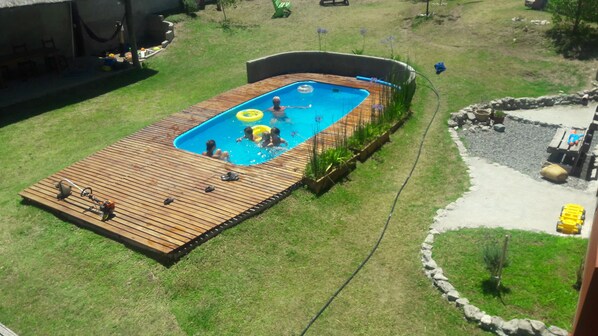 Outdoor pool, pool umbrellas, pool loungers