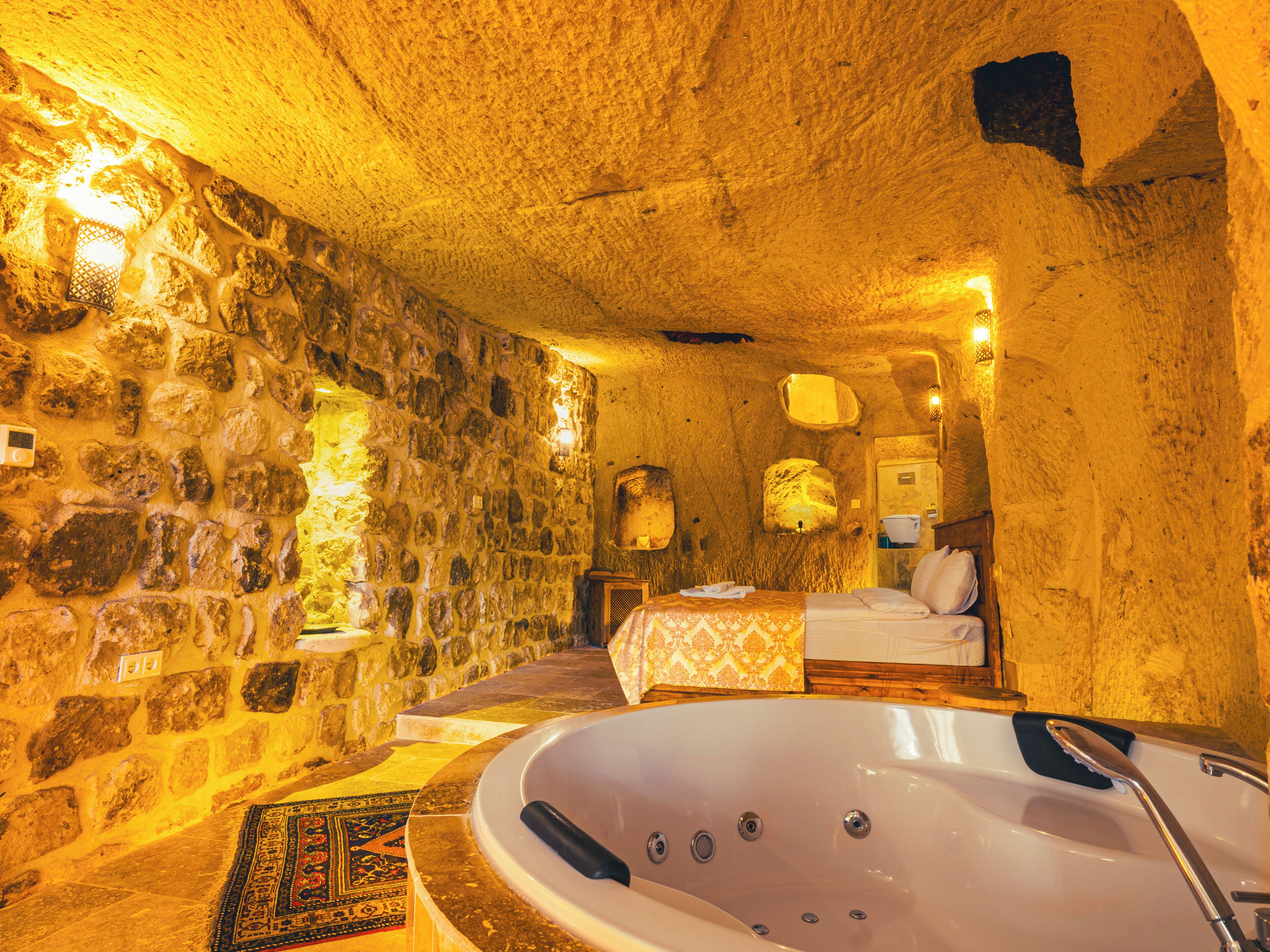 Room 8 Deluxe Cave Suite | Premium bedding, minibar, individually decorated, individually furnished