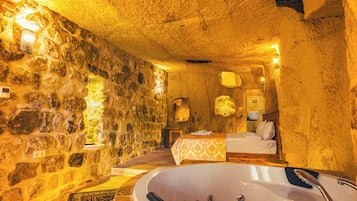 Room 8 Deluxe Cave Suite | Premium bedding, minibar, individually decorated, individually furnished