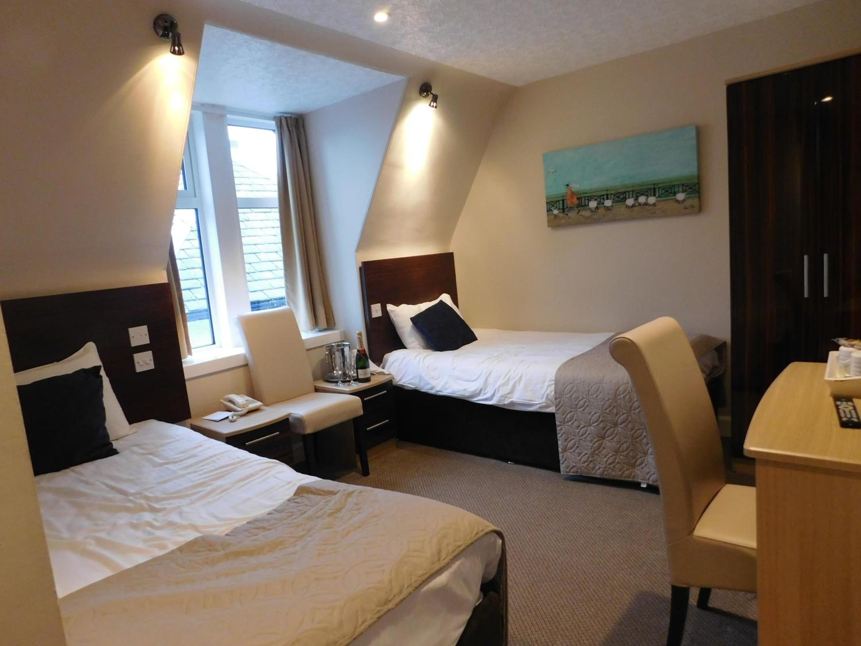 premium bedding, blackout curtains, iron/ironing board, free wifi