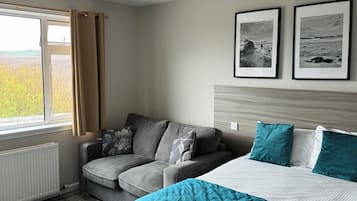 Literie de qualité, rideaux d’obscurcissement, fer et planche à repasser