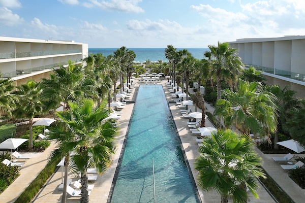 3 outdoor pools, cabanas (surcharge), pool umbrellas