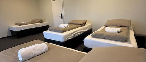 Standard Quadruple Room | Blackout drapes, free WiFi, bed sheets