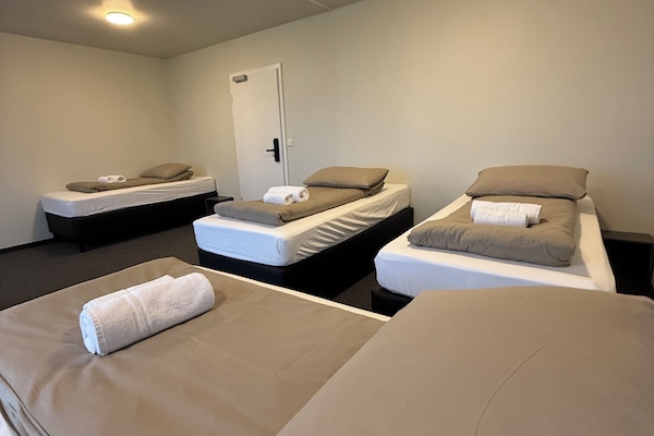 Standard Quadruple Room | Blackout curtains, free WiFi, bed sheets