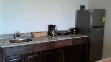 Deluxe Double Room, 2 Queen Beds, Non Smoking | Private kitchen | Full-sized fridge, microwave, stovetop, coffee/tea maker
