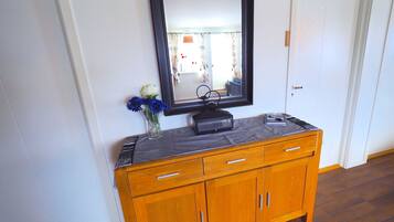 Apartment, Sea View | Living area | Flat-screen TV