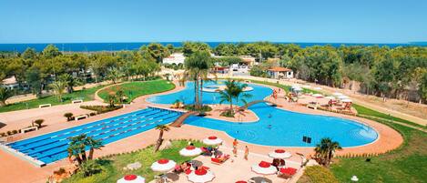 2 outdoor pools, pool umbrellas, sun loungers