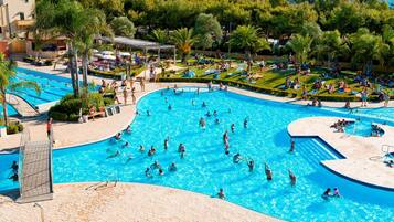 2 outdoor pools, pool umbrellas, pool loungers