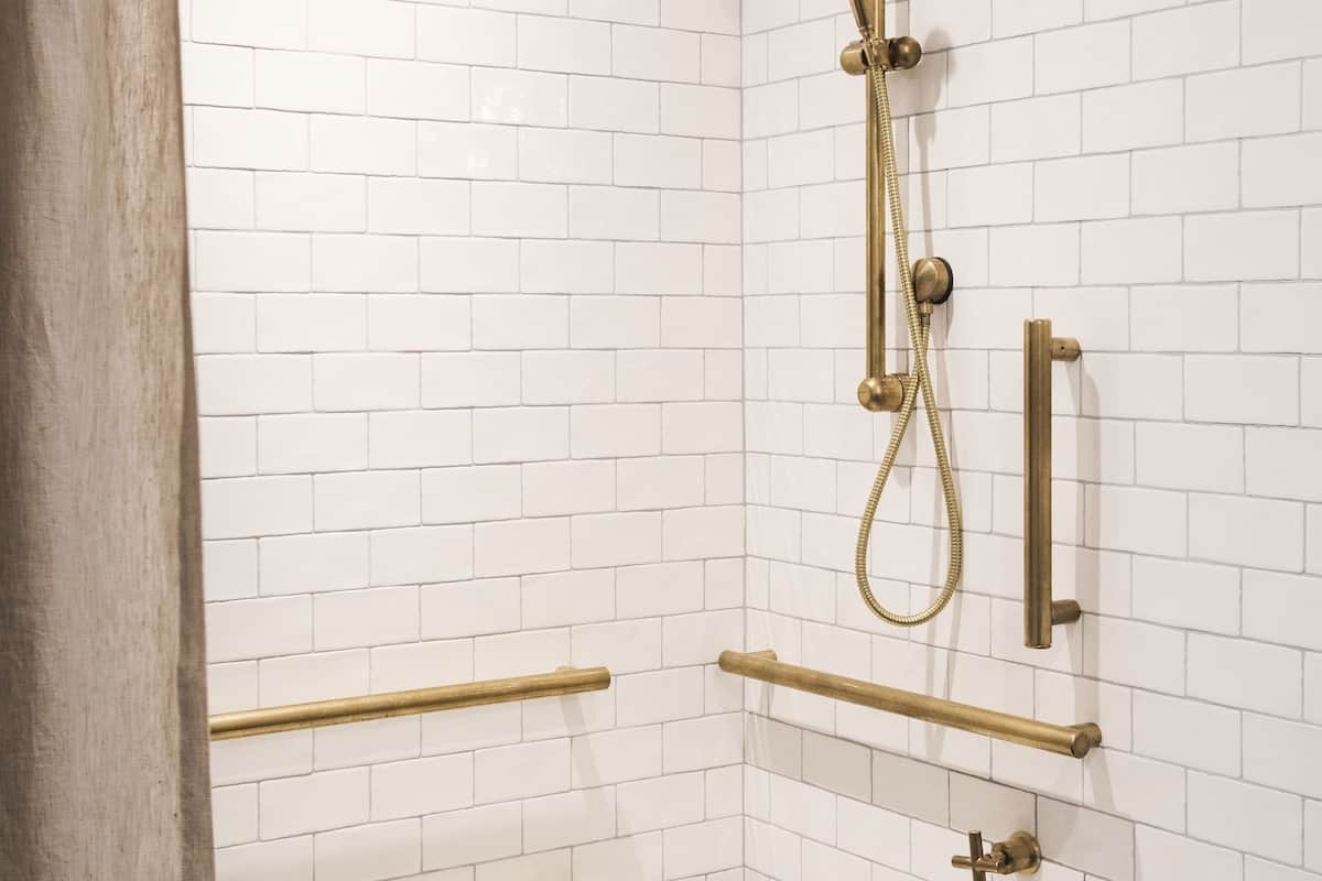 roomy | bathroom | shower, designer toiletries, hair dryer, towels