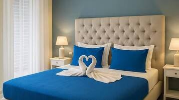 Deluxe Suite, Non Smoking | Cadar kapas Mesir, peralatan tempat tidur premium, bar mini, meja