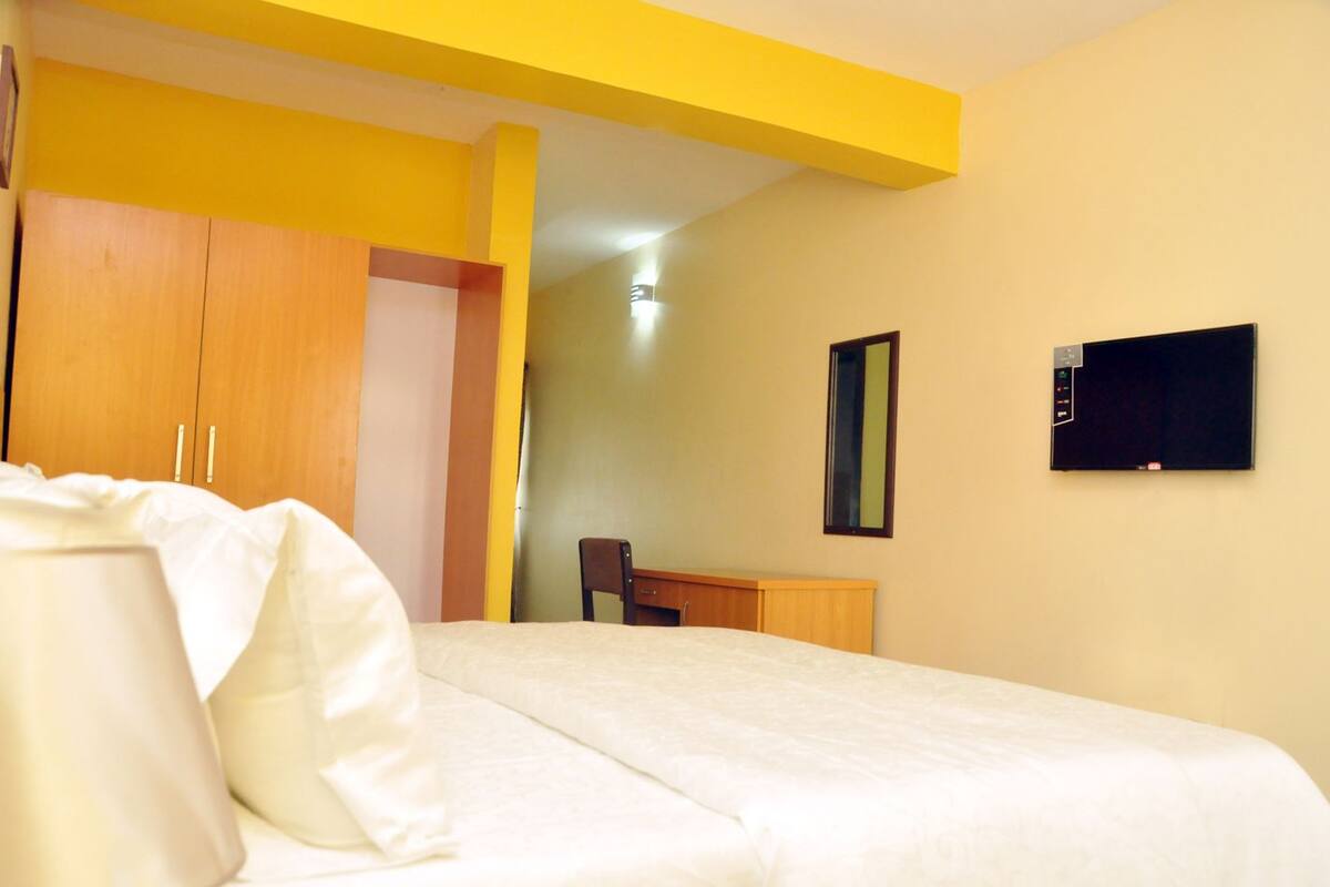 Minibar, desk, laptop workspace, blackout curtains
