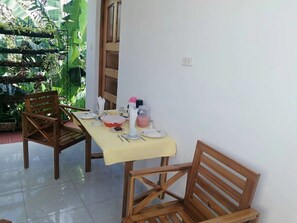 Enjoy meals for two in this cozy dining area with a table set for a romantic evening.