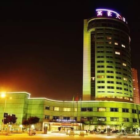 Front of property - evening/night. Wanshun Hotel