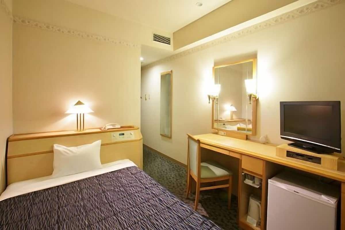 Desk, blackout curtains, free WiFi, bed sheets