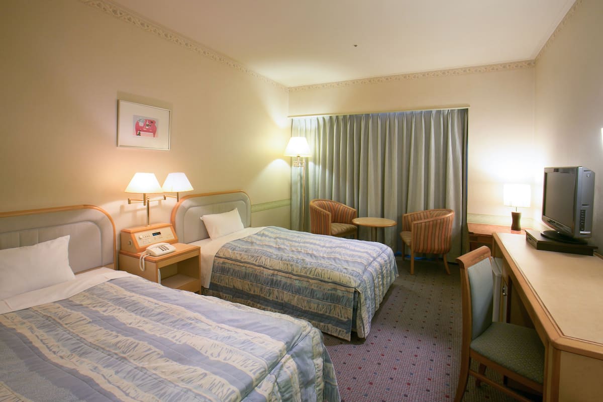 Desk, blackout curtains, free WiFi, bed sheets