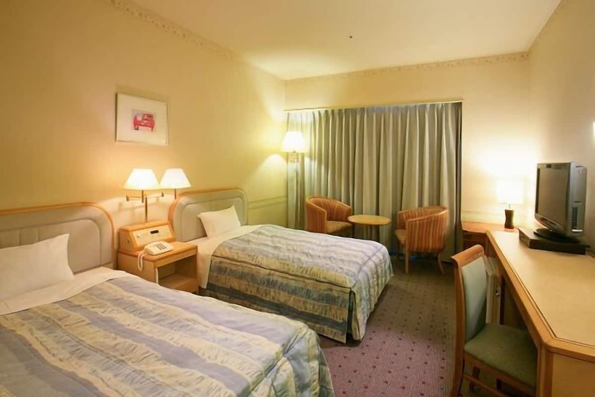 Desk, blackout curtains, free WiFi, bed sheets