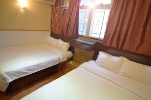 Basic Triple Room, Multiple Beds, Non Smoking | Iron/ironing board, free WiFi, bed sheets - Wai Fan Guest House (Kowloon)