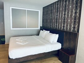 Suite Room (Zone C) | Minibar, blackout drapes, free WiFi, bed sheets
