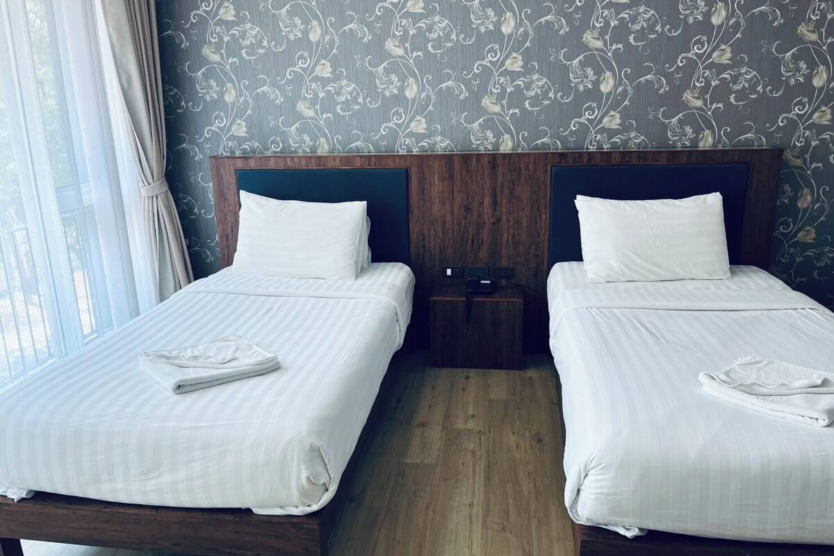 Standard Twin (Zone C) | 迷你吧、遮光窗帘、免费 WiFi、床单