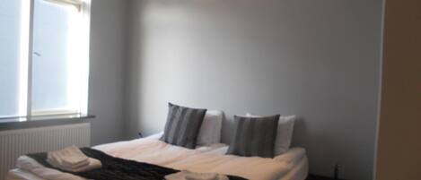 Blackout curtains, soundproofing, rollaway beds, free WiFi