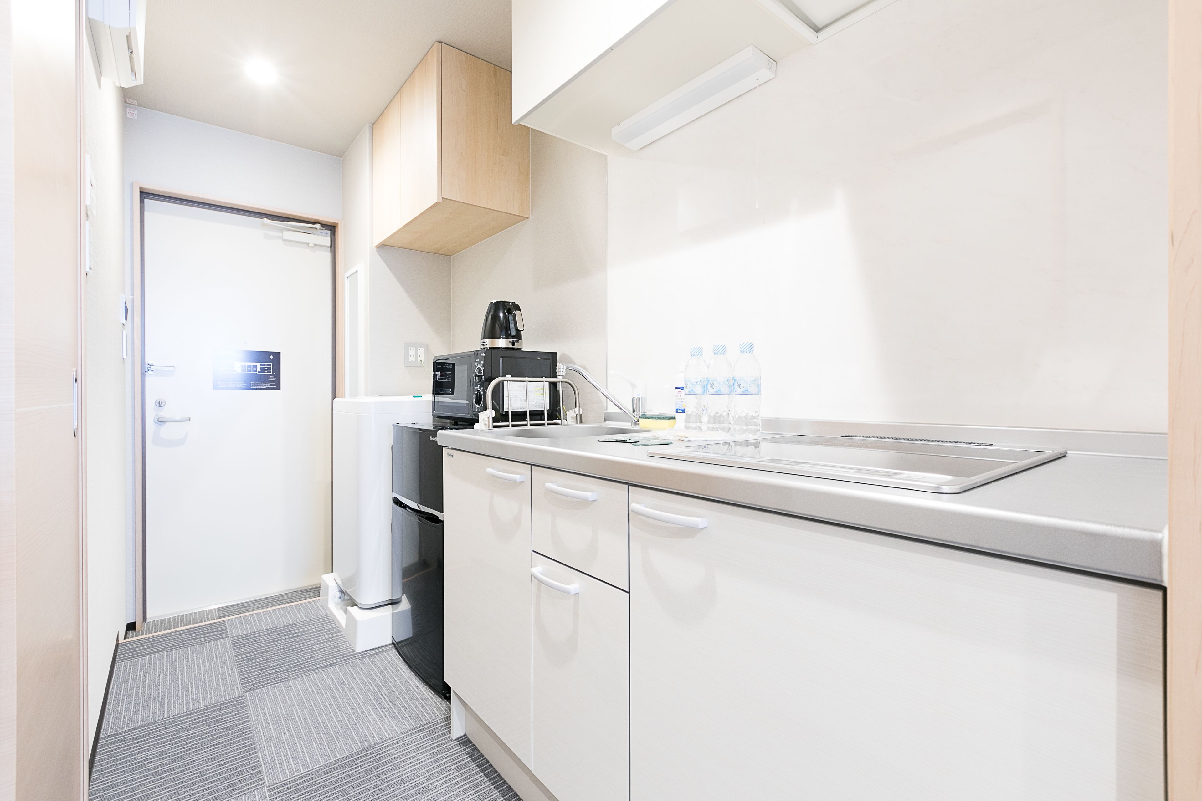 superior apartment | private kitchenette | fridge, microwave, stovetop, electric kettle