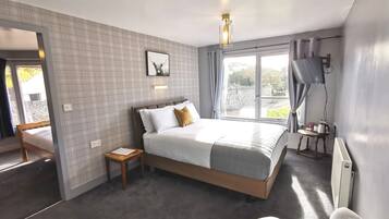Deluxe Quadruple Room, 2 Bedrooms, Ensuite, Garden View (Wing King Room 14-Ground Floor) | Individually decorated, individually furnished, blackout drapes