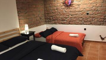 Blackout curtains, iron/ironing board, rollaway beds, free WiFi