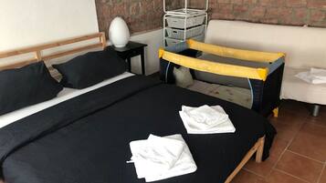 Blackout drapes, iron/ironing board, rollaway beds, free WiFi