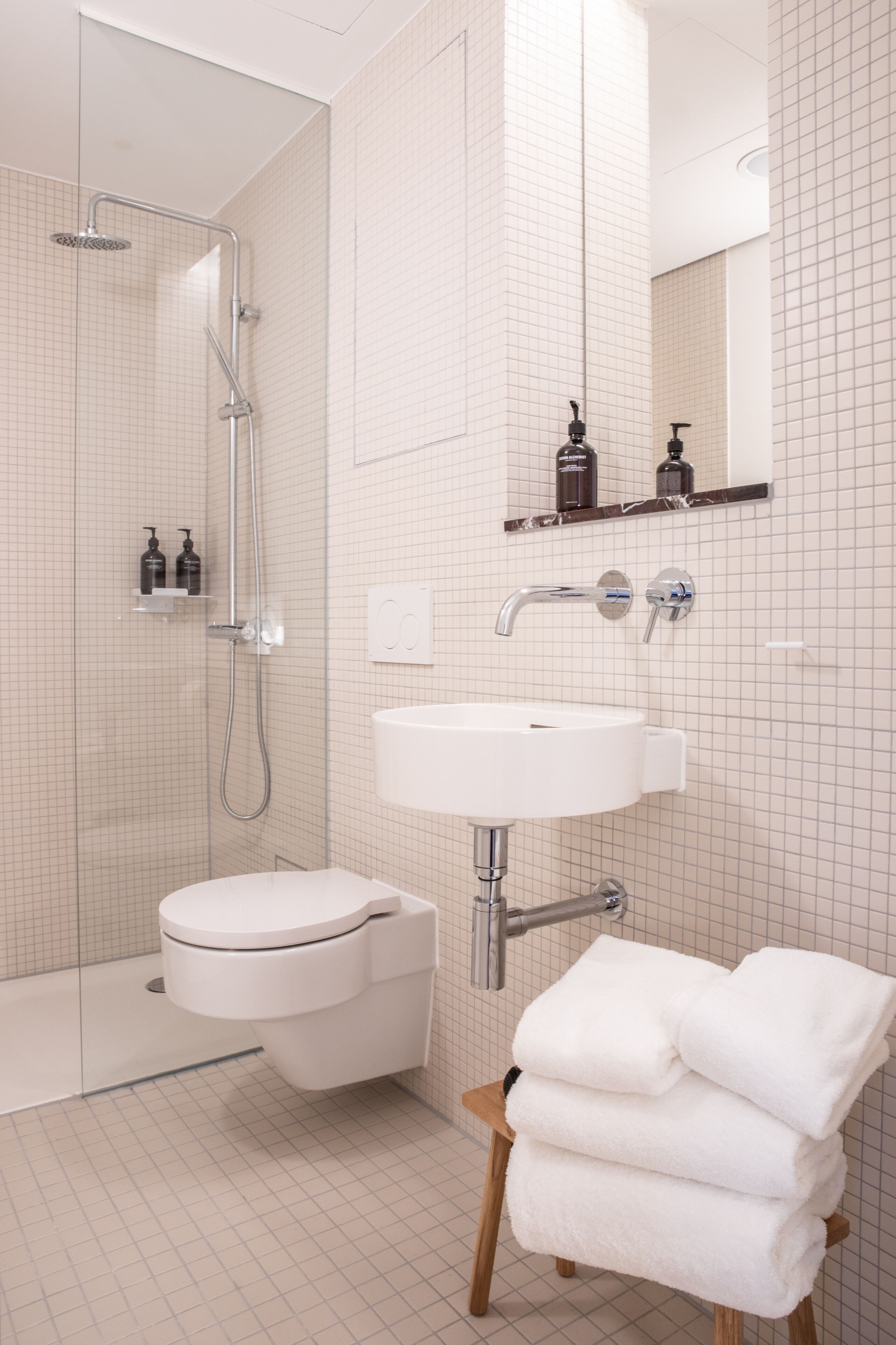 designer toiletries, hair dryer, heated floors, towels