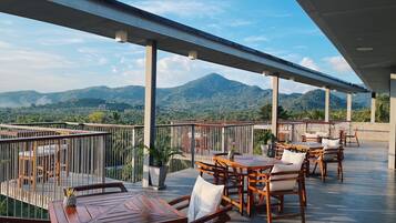 Breakfast, lunch, dinner served; pool views