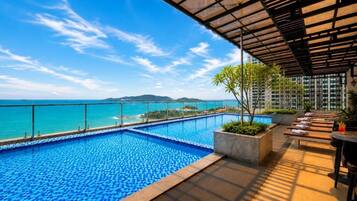 2 outdoor pools, pool umbrellas, pool loungers