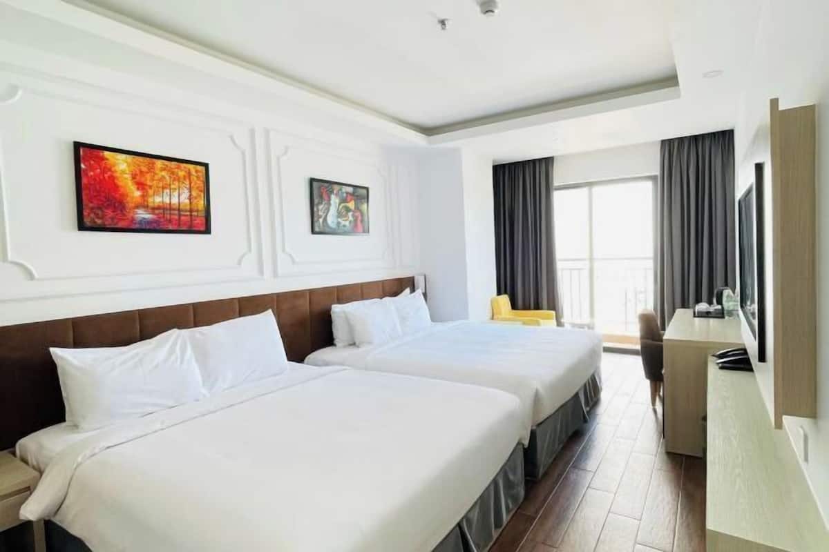 Premium bedding, memory foam beds, minibar, in-room safe