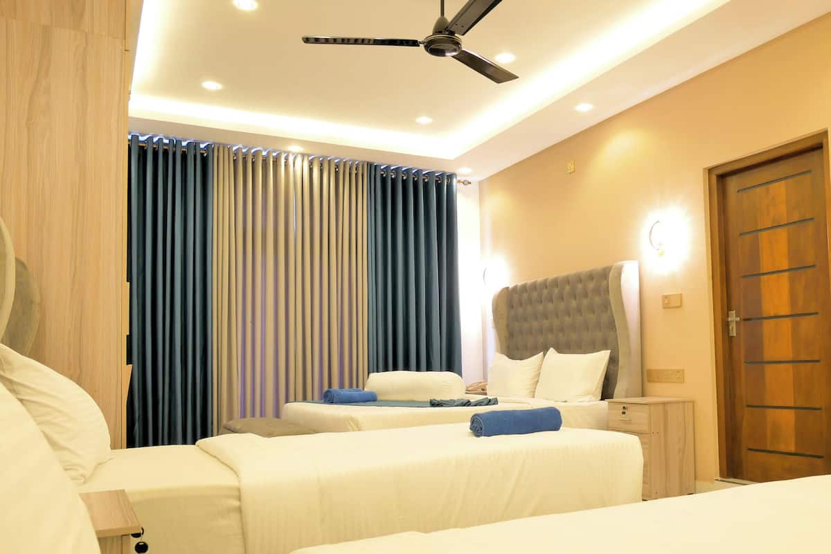 Royal Quadruple Room | Egyptian cotton sheets, premium bedding, down comforters, pillowtop beds