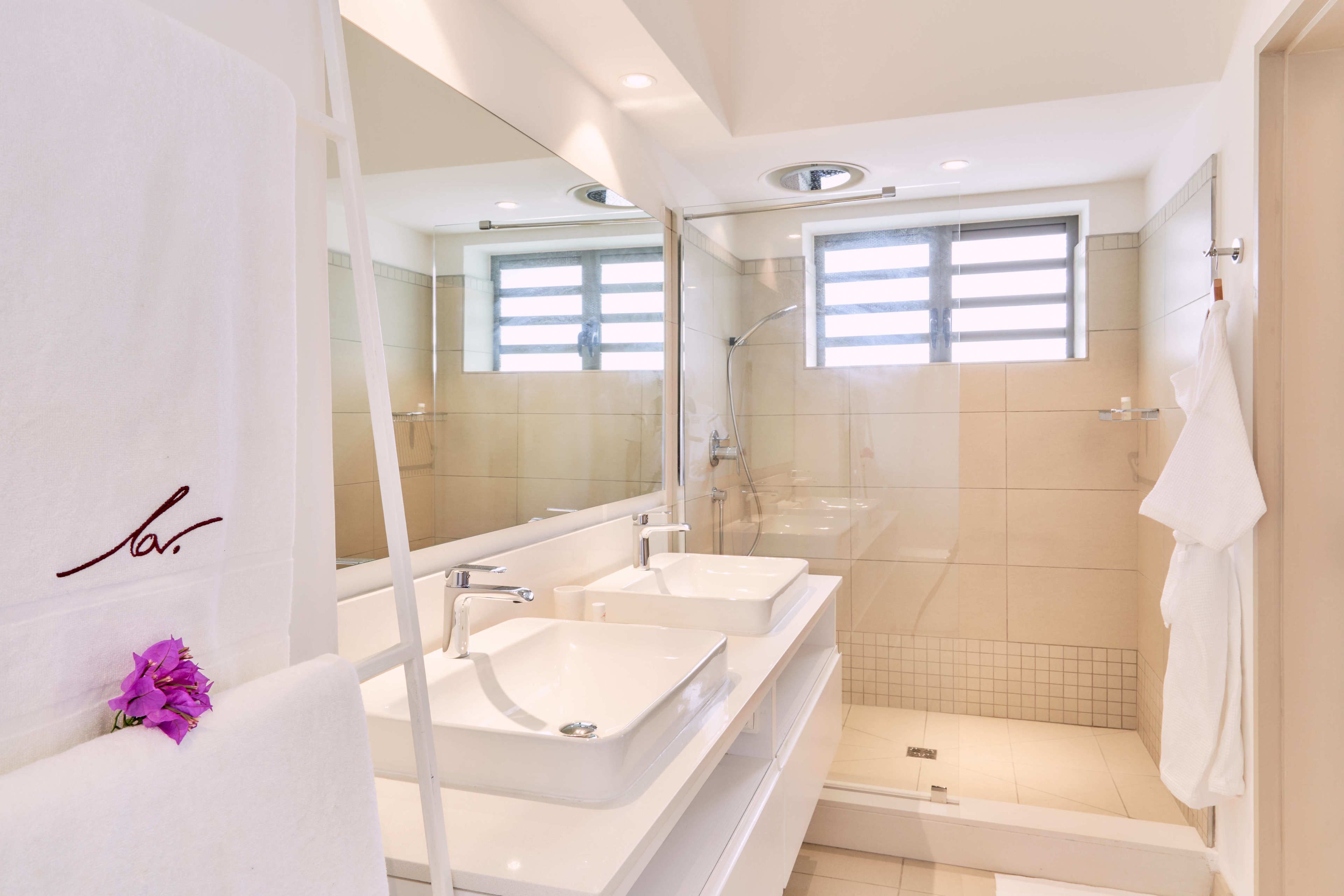 2 bedroom suite | bathroom | shower, rainfall showerhead, free toiletries, towels