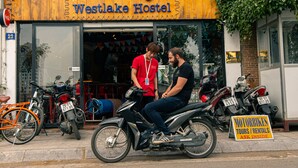 A hostel with a signboard reading "Fridays Westlake Hostel".