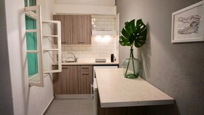City Apartment | Private kitchenette | Espresso maker, coffee/tea maker, full-sized fridge, stovetop - Urban Garden Apartments (Agios Nikolaos)