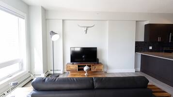 Apartment, 2 Queen Beds, Non Smoking | Living room | 50-inch Smart TV with cable channels, TV