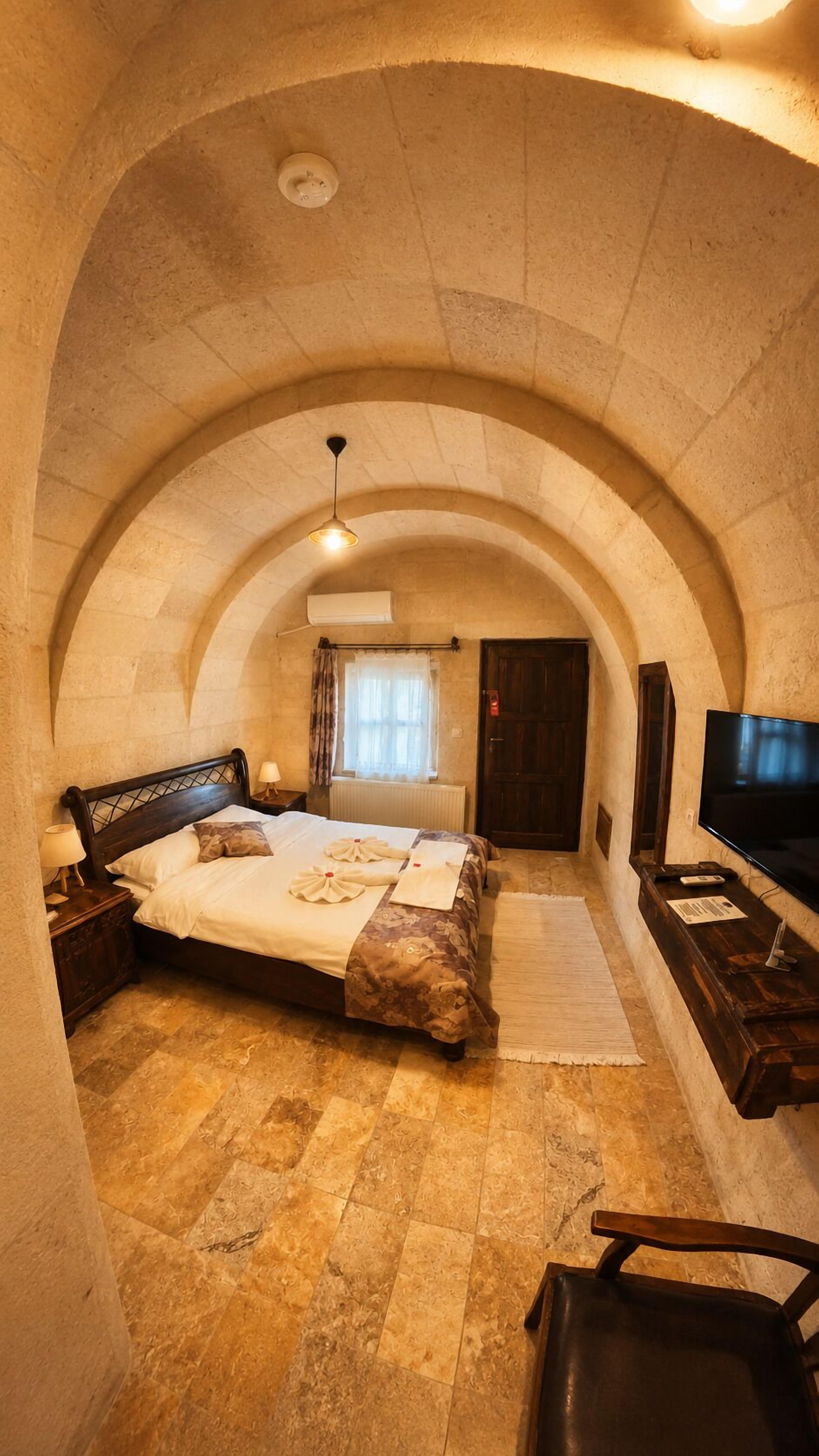 Yesil Room | Minibar, accès au Wi-Fi (inclus), literie fournie