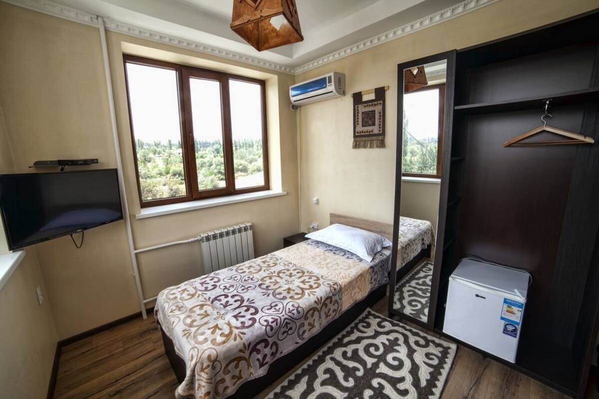 Single Room, Mountain View | Minibar, in-room safe, soundproofing, iron/ironing board (on request)