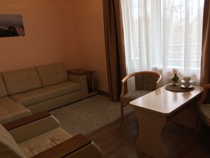 Suite | Área de sala de estar | Televisión LCD 