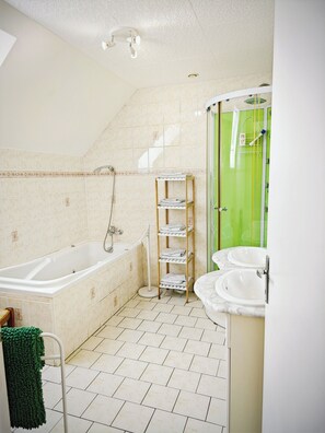 Shower, free toiletries, hair dryer, towels