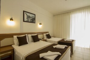 Standard Triple Room | Minibar, in-room safe, soundproofing, free cots/infant beds - Belcekum Beach Hotel (Fethiye)
