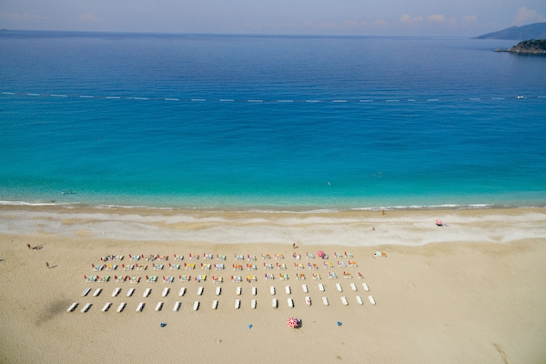 On the beach, white sand, beach towels