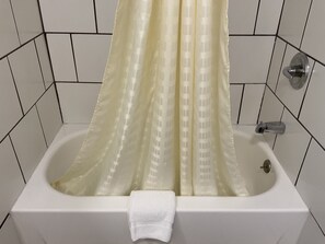 Deep soaking tub, towels