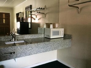 Combined shower/tub, deep soaking tub, free toiletries