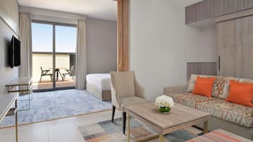 Junior Suite, 1 King Bed, Balcony | Minibar, in-room safe, desk, blackout drapes