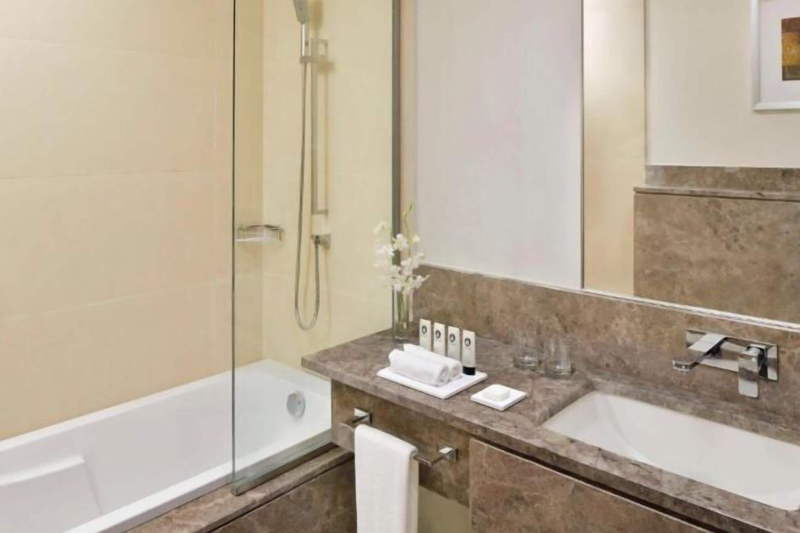 Shower, rainfall showerhead, eco-friendly toiletries, hair dryer