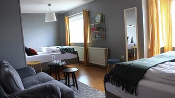 Quadruple Room, Shared Bathroom | Individually decorated, individually furnished, blackout drapes